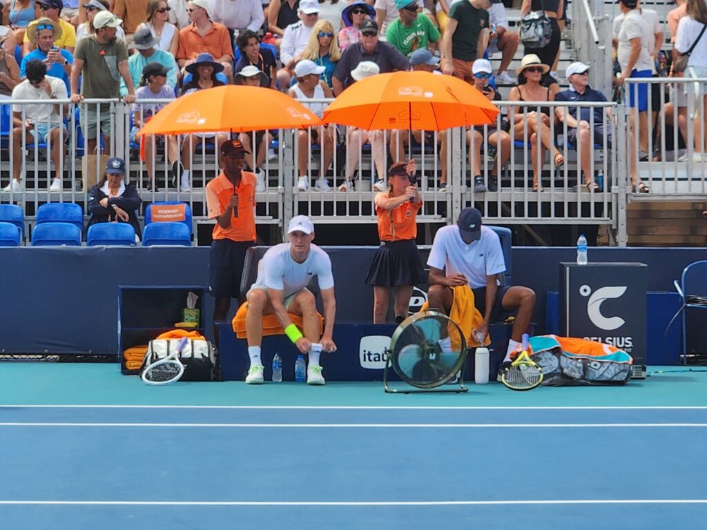 ATP pro tennis players with their tennis bags