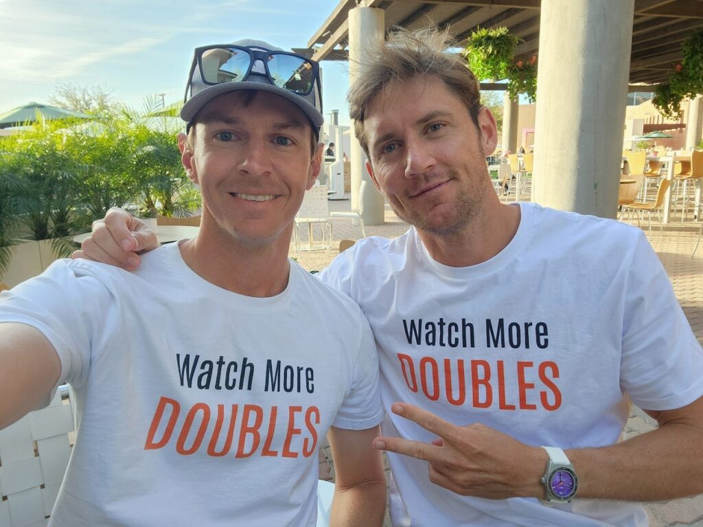Matt Ebden and Will Boucek in their Watch More Doubles T-shirts