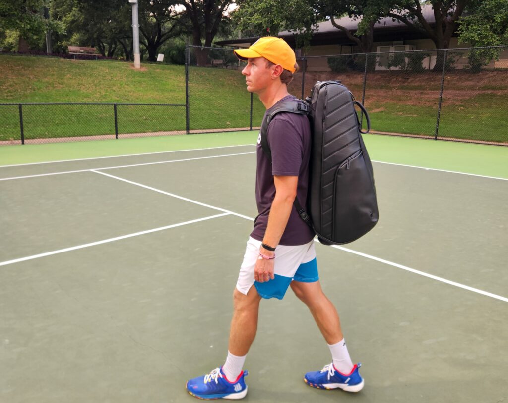 Person carrying the Vessel tennis bag